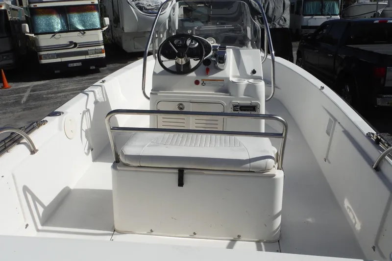 Slide: The Image of 2007 Boston Whaler 180 Dauntless boat interior with steering console and seating. - 7