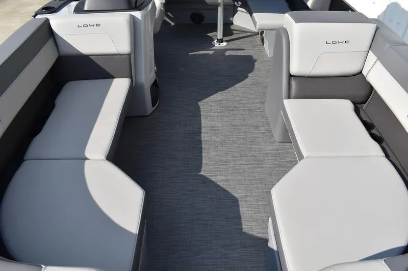 Slide: The Image of 2026 Lowe LS 170 boat interior with gray seating and flooring. - 10