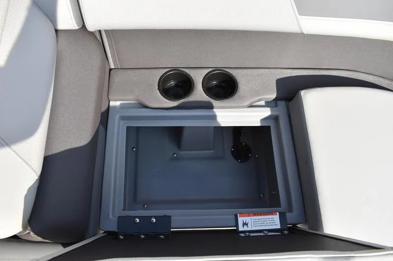 Slide: The Image of Open storage compartment in 2026 Lowe LS 170 boat with gray seating. - 19