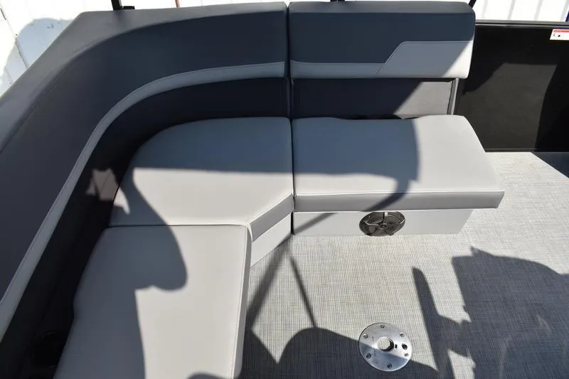 Slide: The Image of 2026 Lowe LS 170 boat interior with gray cushioned seating and modern design. - 36