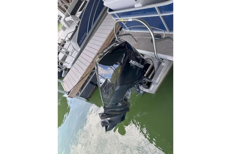 Slide: The Image of 2024 Godfrey SWEETWATER 2486 DT with Mercury outboard motor at dock. - 4