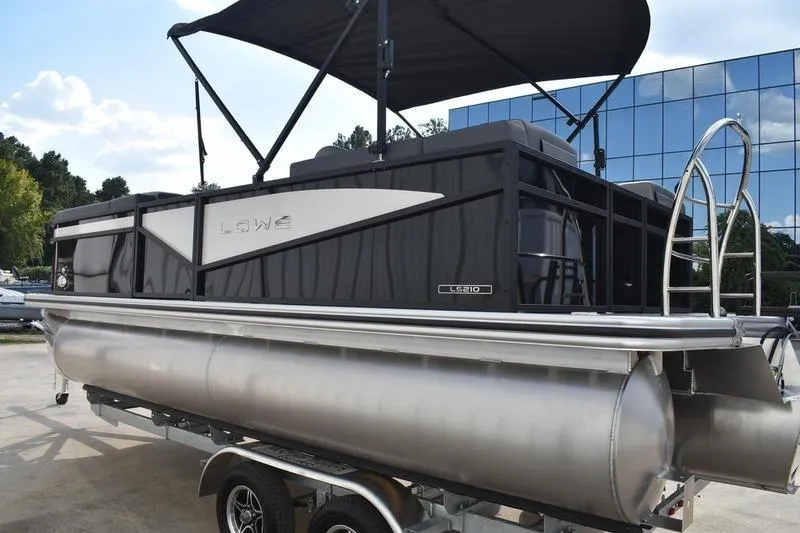 Slide: The Image of 2026 Lowe LS 210 WT boat seat with gray upholstery and logo. - 10