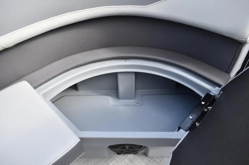 Slide: The Image of 2026 Lowe LS 210 WT boat interior with gray seating and flooring. - 24