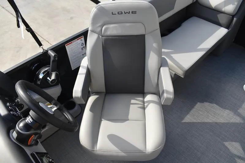 Slide: The Image of Kicker media center in 2026 Lowe LS 210 WT boat dashboard. - 32