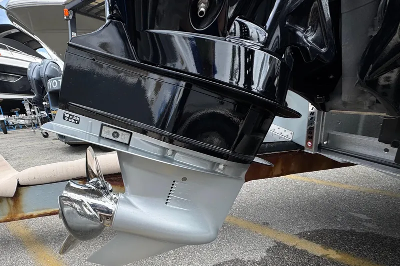 Slide: The Image of Close-up of a 2026 Piranha B2000 boat motor with a shiny propeller. - 11