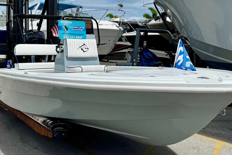 Slide: The Image of 2026 Piranha B2000 boat displayed at a marina, featuring sleek design and modern amenities. - 14