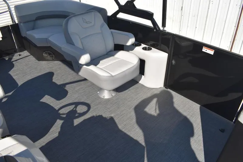 Slide: The Image of 2026 Lowe SS 230 boat seat with cup holders and storage compartment. - 23