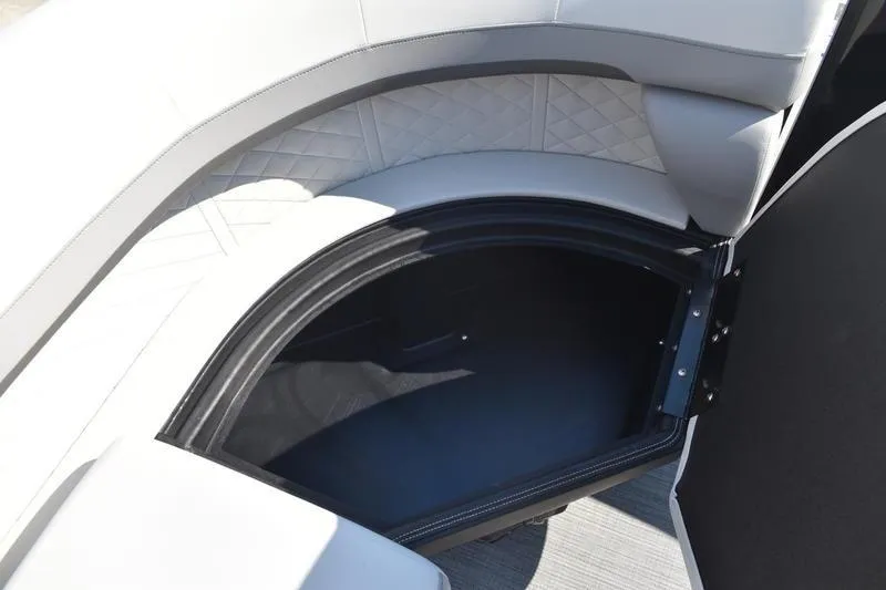 Slide: The Image of 2026 Lowe SS 230 boat interior with steering wheel and comfortable seating. - 25