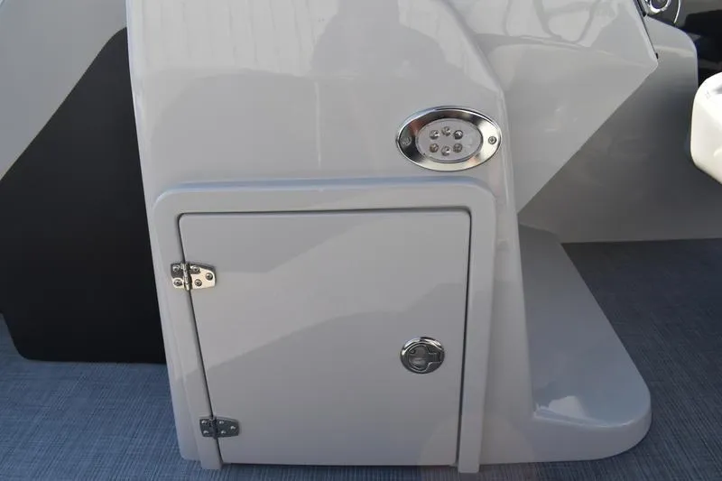 Slide: The Image of 2026 Lowe SS 230 boat console with storage compartment and LED light. - 28