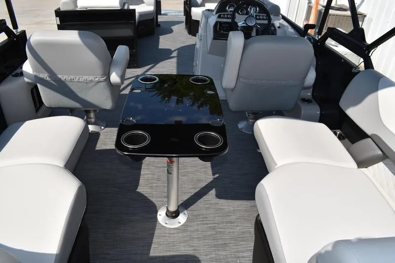 Slide: The Image of Luxurious seating on 2026 Lowe SS 230 boat, featuring sleek gray upholstery and modern design. - 40