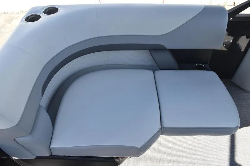 Slide: The Image of Storage compartment in 2026 Lowe SS 230 boat with cushioned seating. - 44