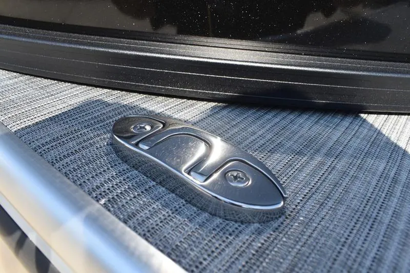 Slide: The Image of Close-up of a 2026 Lowe SS 230 boat cleat on textured surface. - 52