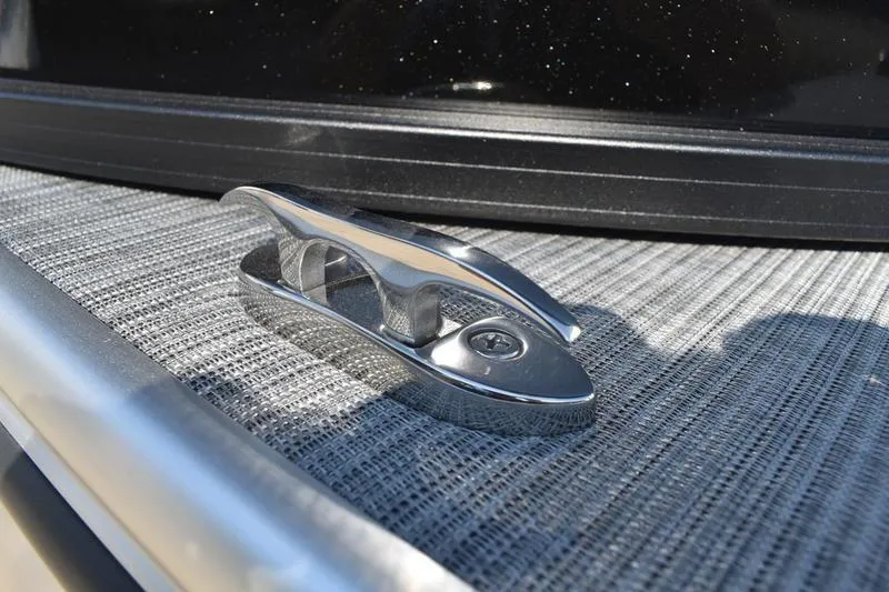 Slide: The Image of Close-up of a cleat on a 2026 Lowe SS 230 boat deck. - 53