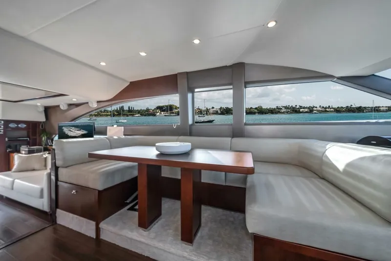 Slide: The Image of Luxurious 2012 Princess 64 Flybridge Motor Yacht with spacious deck and elegant seating. - 13