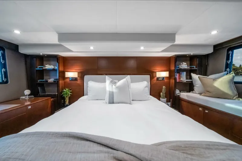 Slide: The Image of Luxurious interior of 2012 Princess 64 Flybridge Motor Yacht with modern kitchen and dining area. - 22