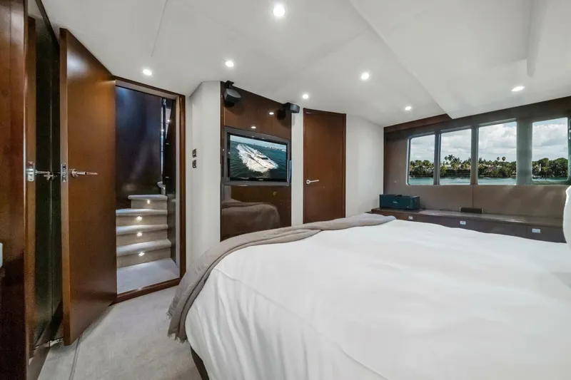 Slide: The Image of Luxurious interior of 2012 Princess 64 Flybridge Motor Yacht with elegant seating and dining area. - 23