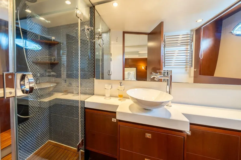 Slide: The Image of Luxurious bathroom in 2012 Princess 64 Flybridge Motor Yacht with modern fixtures and elegant design. - 36