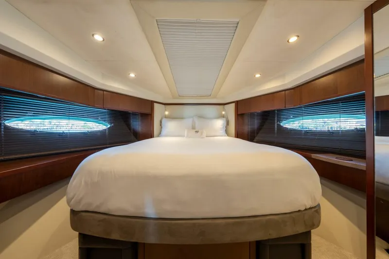 Slide: The Image of Luxurious bedroom interior of 2012 Princess 64 Flybridge Motor Yacht with elegant wood finishes. - 42