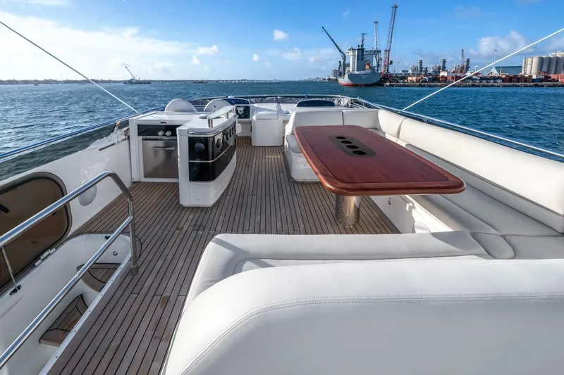 Slide: The Image of Bow view from 2012 Princess 64 Flybridge Motor Yacht on a sunny day. - 6