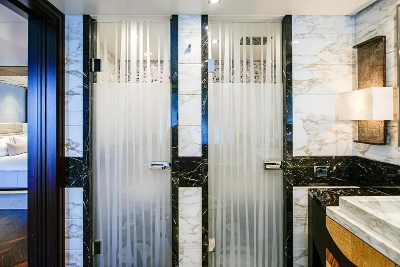 Slide: The Image of Luxurious interior of 2013 Feadship motor yacht with elegant wooden staircase. - 10