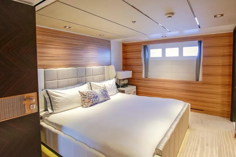 Slide: The Image of Luxurious 2013 Feadship motor yacht bedroom with elegant decor and ocean view. - 11