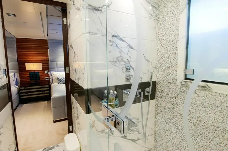 Slide: The Image of Luxurious bathroom on 2013 Feadship motor yacht with elegant marble and mosaic design. - 16