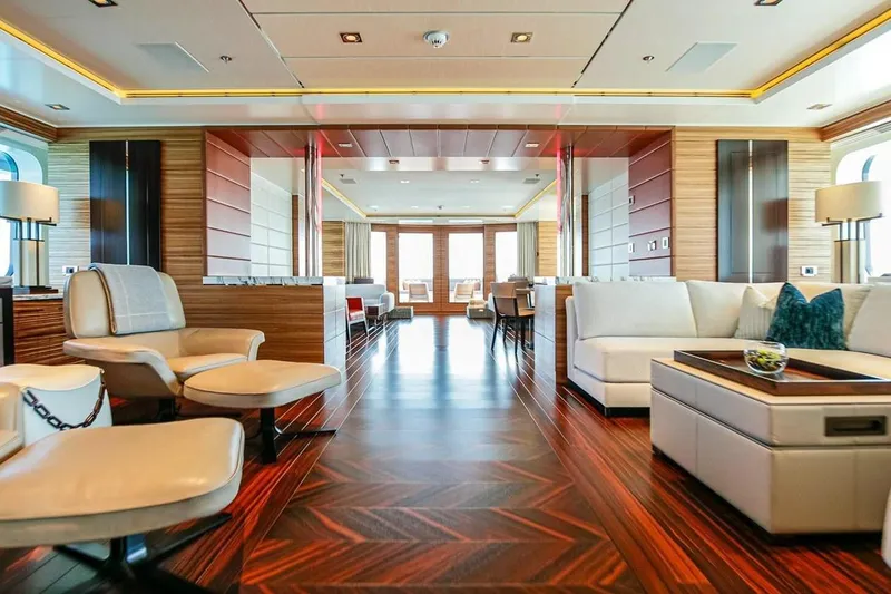 Slide: The Image of Luxurious 2013 Feadship motor yacht interior with elegant seating and ocean view. - 2