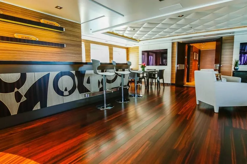 Slide: The Image of Luxurious interior of 2013 Feadship motor yacht with elegant desk and scenic window view. - 20