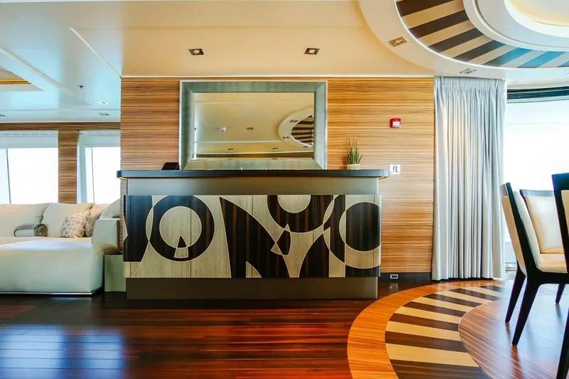 Slide: The Image of Luxurious interior of 2013 Feadship motor yacht with elegant wood paneling and modern staircase. - 21