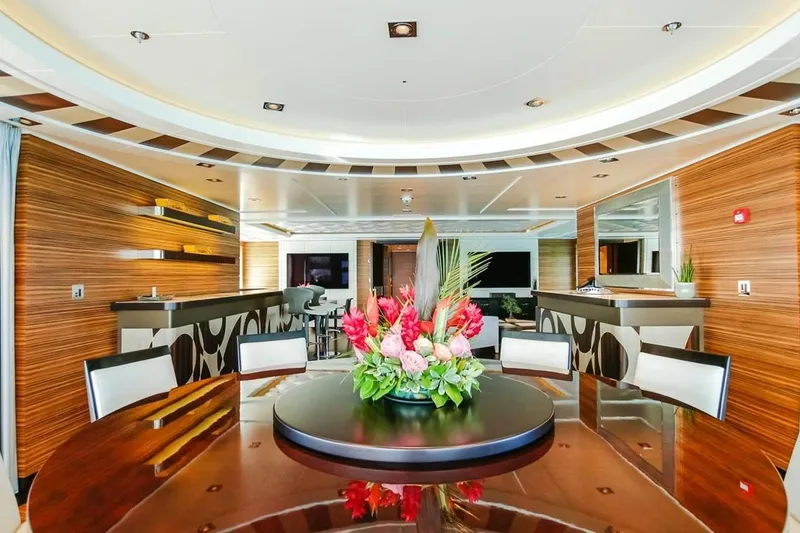 Slide: The Image of Luxurious bedroom interior on a 2013 Feadship motor yacht, featuring elegant wood paneling. - 22