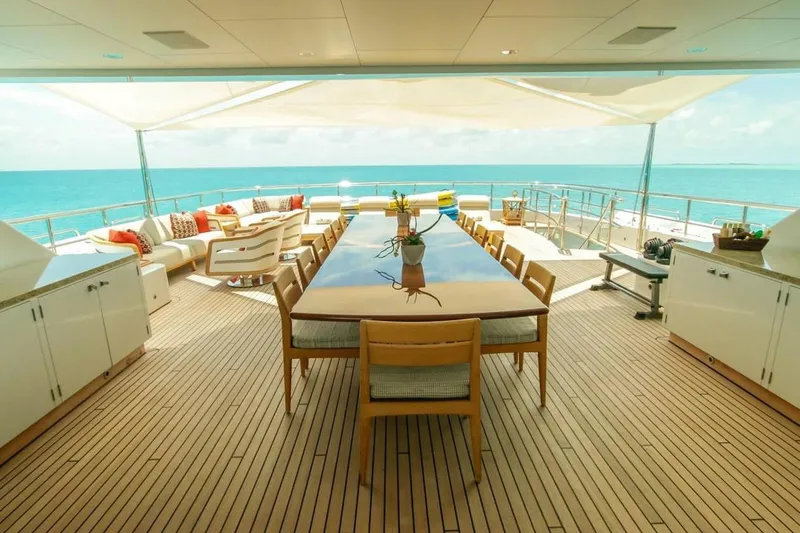 Slide: The Image of Luxurious bedroom interior on 2013 Feadship motor yacht, featuring elegant wood paneling and modern design. - 33