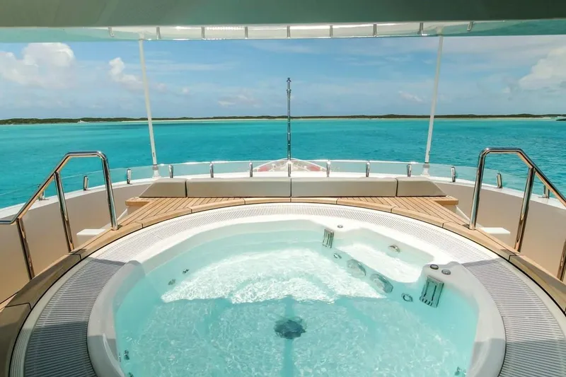 Slide: The Image of Luxurious 2013 Feadship motor yacht bedroom with twin beds and elegant wood paneling. - 36