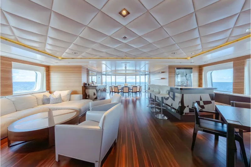 Slide: The Image of Luxurious interior of 2013 Feadship motor yacht with elegant seating and ocean views. - 47