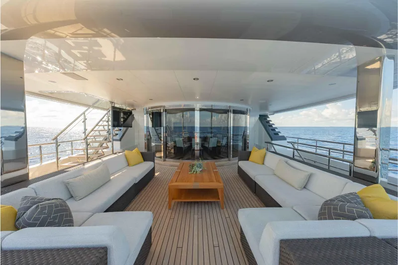 Slide: The Image of Luxurious 2013 Feadship motor yacht deck with elegant seating and ocean view. - 55