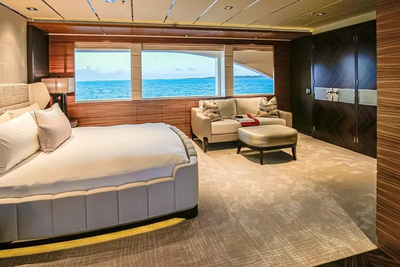 Slide: The Image of Luxurious 2013 Feadship motor yacht interior with elegant seating and ocean view. - 6