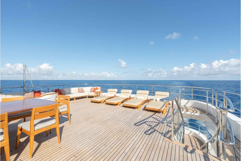 Slide: The Image of Luxurious 2013 Feadship motor yacht deck with sun loungers and ocean view. - 65