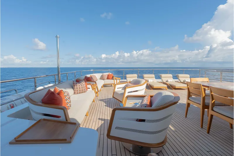 Slide: The Image of Luxurious 2013 Feadship motor yacht deck with elegant seating and ocean view. - 66