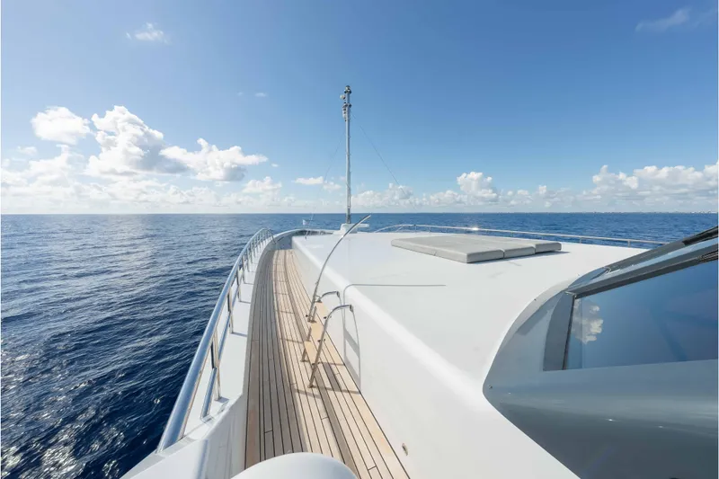 Slide: The Image of Luxurious 2013 Feadship motor yacht cruising on open sea under clear blue sky. - 67