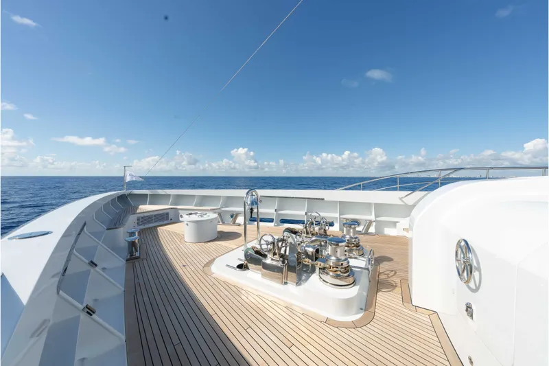 Slide: The Image of Luxurious 2013 Feadship motor yacht deck with ocean view and clear blue sky. - 68
