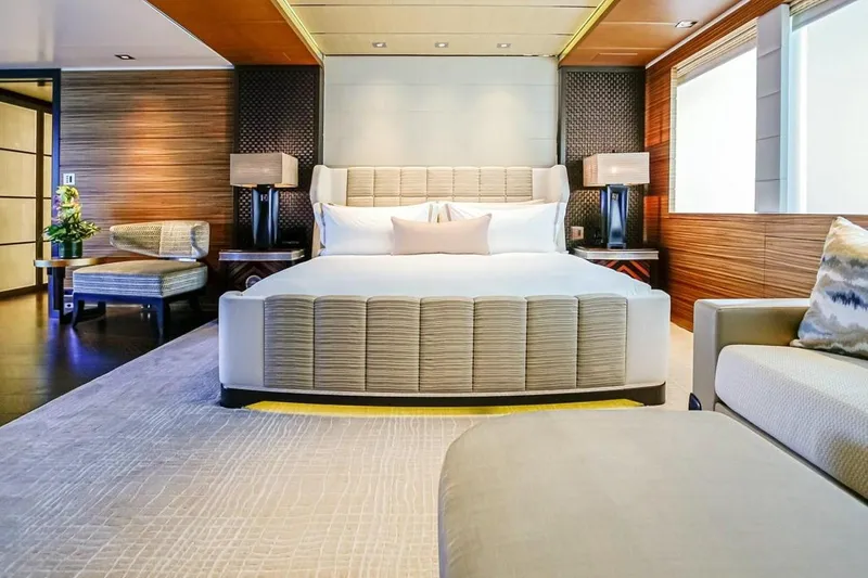 Slide: The Image of Luxurious 2013 Feadship motor yacht interior with elegant wood flooring and modern white seating. - 7