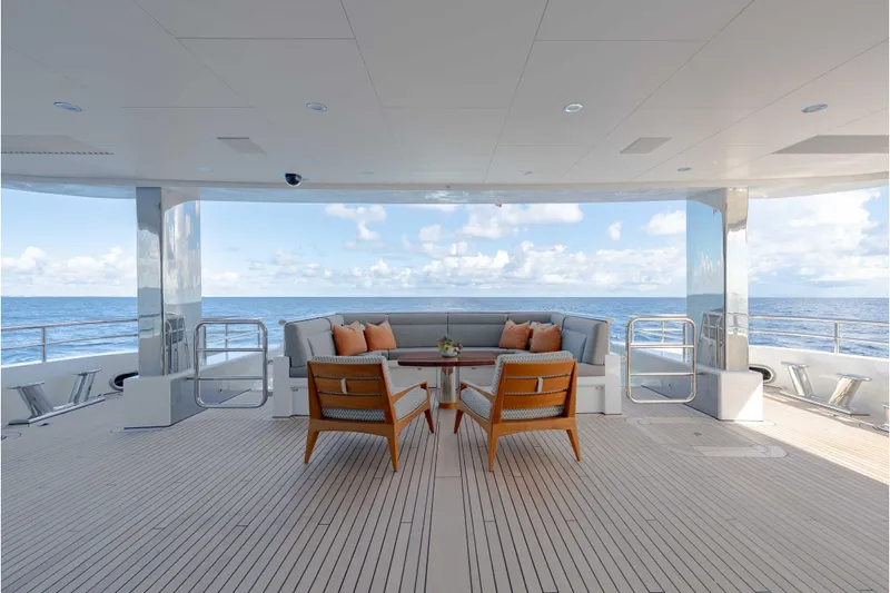 Slide: The Image of Luxurious 2013 Feadship motor yacht deck with elegant seating and ocean view. - 71
