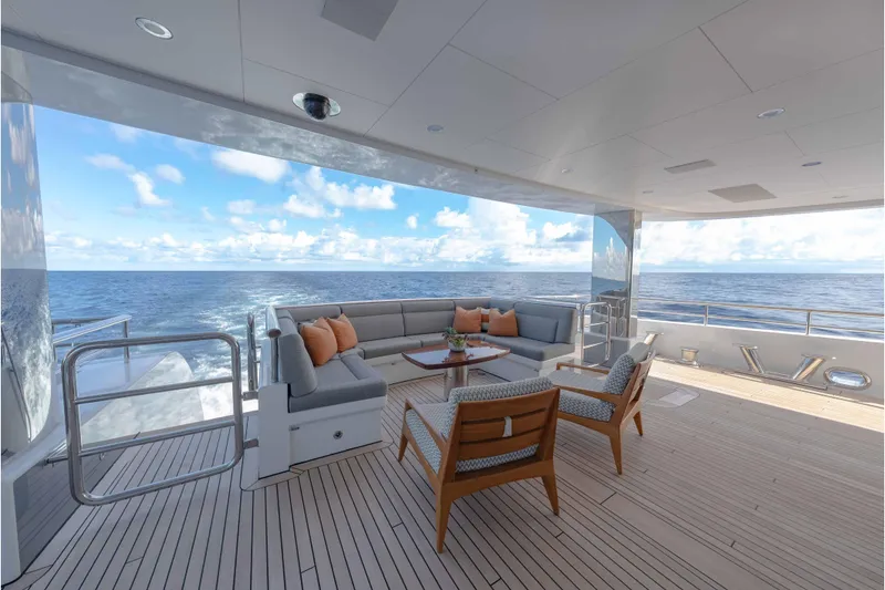 Slide: The Image of Luxurious 2013 Feadship motor yacht deck with ocean view and elegant seating area. - 72