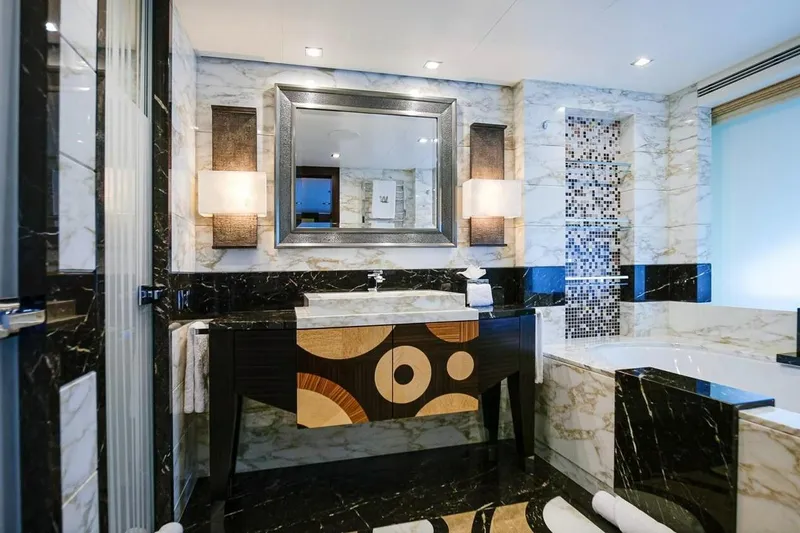 Slide: The Image of Luxurious interior of 2013 Feadship motor yacht with elegant wood and marble finishes. - 8