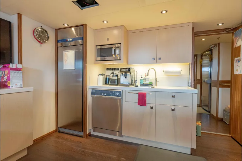 Slide: The Image of Modern kitchen interior on 2013 Feadship motor yacht, featuring stainless steel appliances and sleek cabinetry. - 81