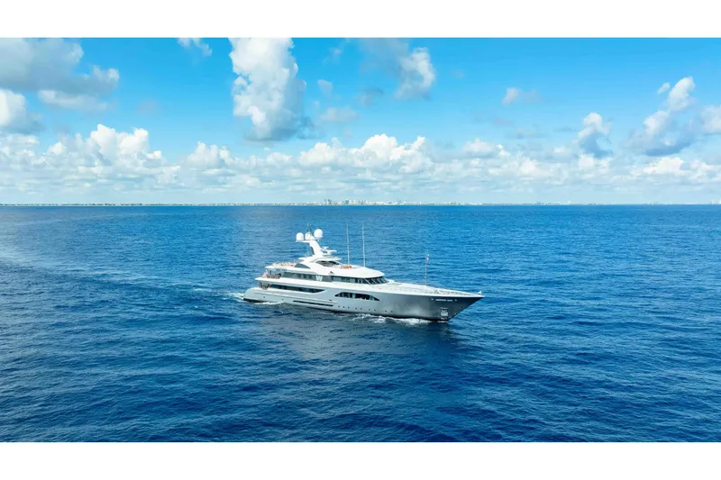 Slide: The Image of Luxurious 2013 Feadship motor yacht cruising on open blue sea under clear skies. - 84