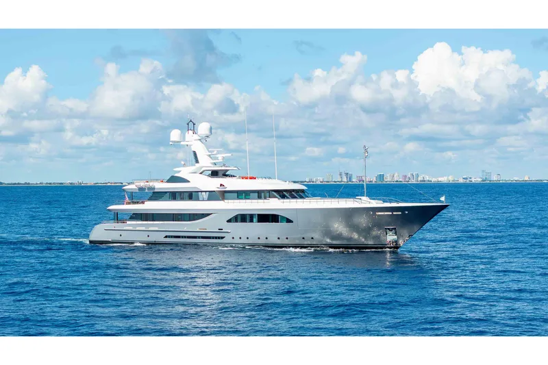 Slide: The Image of Luxurious 2013 Feadship motor yacht cruising on open sea under blue sky. - 85