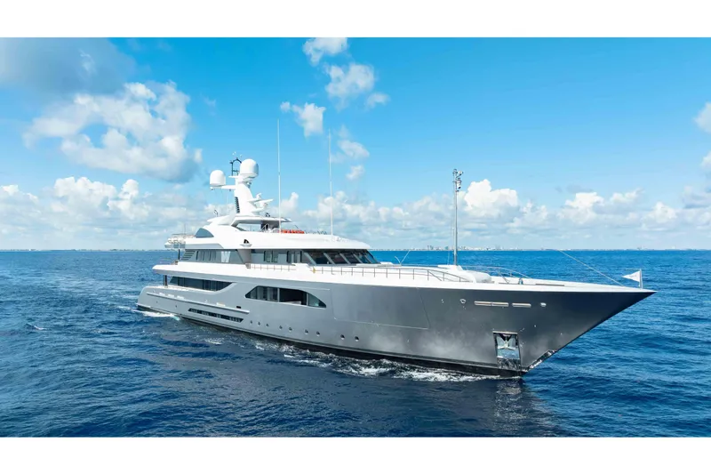 Slide: The Image of Luxurious 2013 Feadship motor yacht cruising on open sea under clear blue sky. - 86