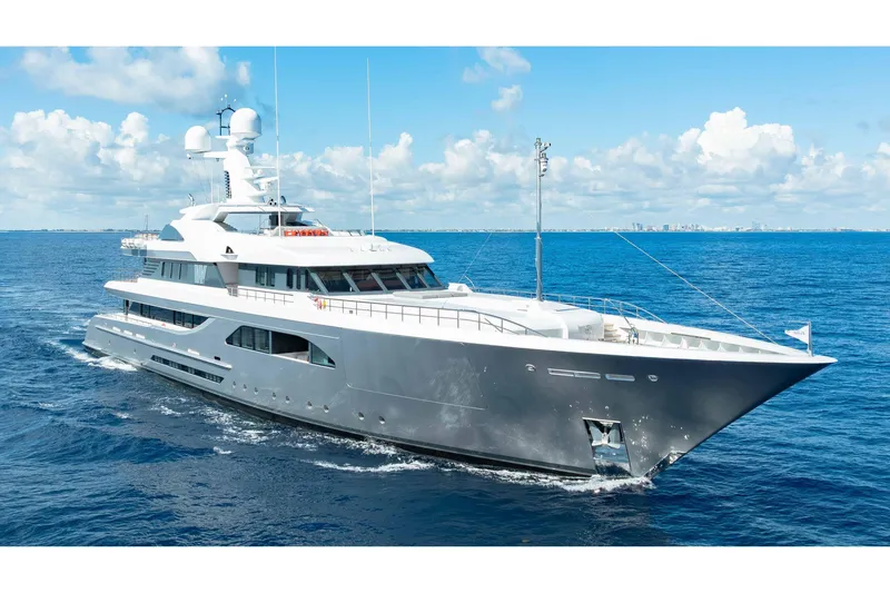 Slide: The Image of Luxurious 2013 Feadship motor yacht cruising on open sea under clear skies. - 87