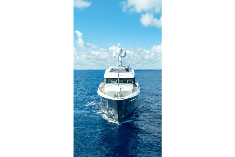 Slide: The Image of Luxurious 2013 Feadship motor yacht cruising on open blue sea. - 89