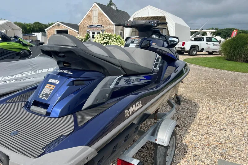 Slide: The Image of 2014 Yamaha WaveRunner FX Cruiser SVHO on trailer, parked outdoors. - 4